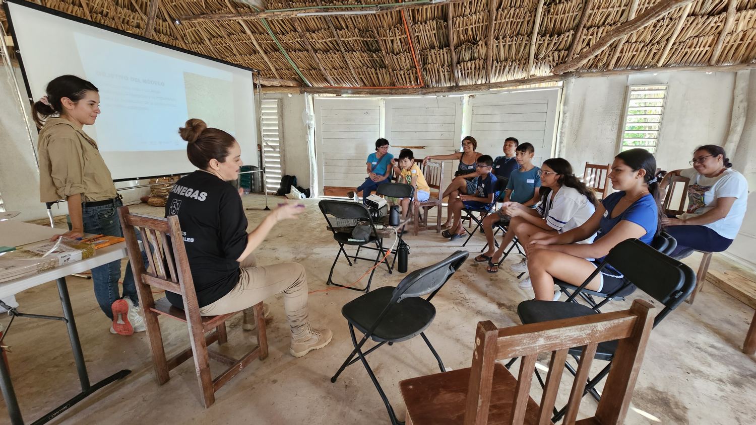 Workshop in a circle under a palapa